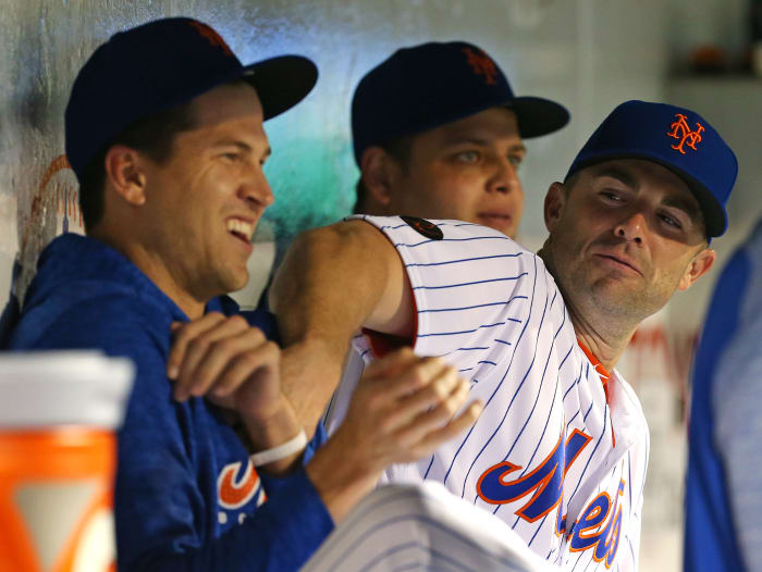 David Wright #5 of the New York Mets clowns around with Jacob deGrom #48 during the eighth inning of a game against the Atlanta Braves at Citi Field on September 27, 2018 in the Flushing neighborhood of the Queens borough of New York City. The Mets defeated the Braves 4-1.